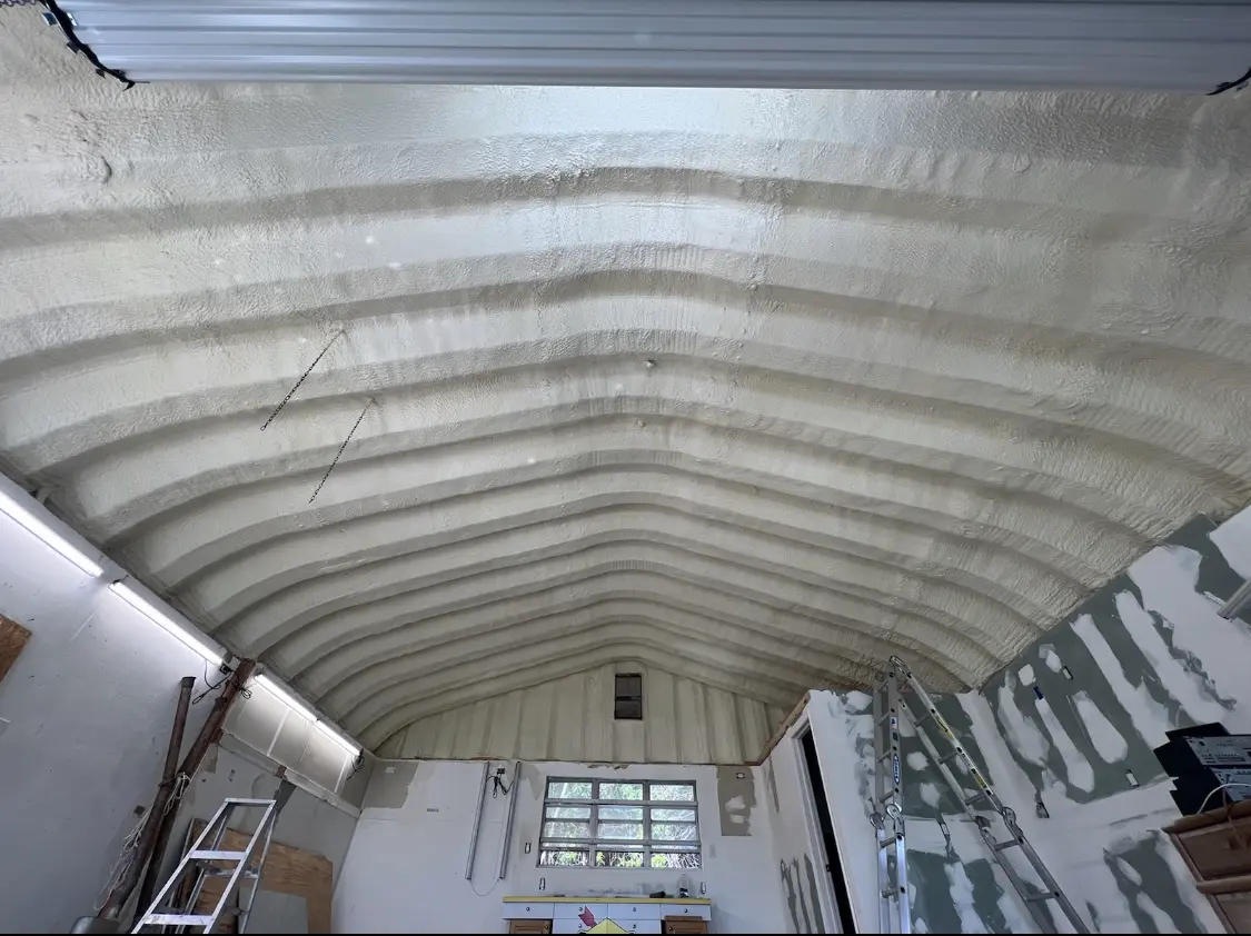 Spray polyurethane foam applied to the underside of a metal roof deck in Normandy Park